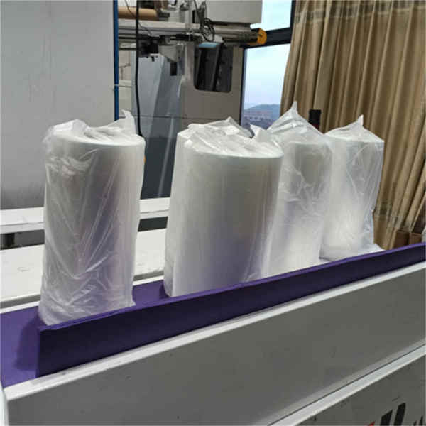 wrapping machine using film wrapping machine using film